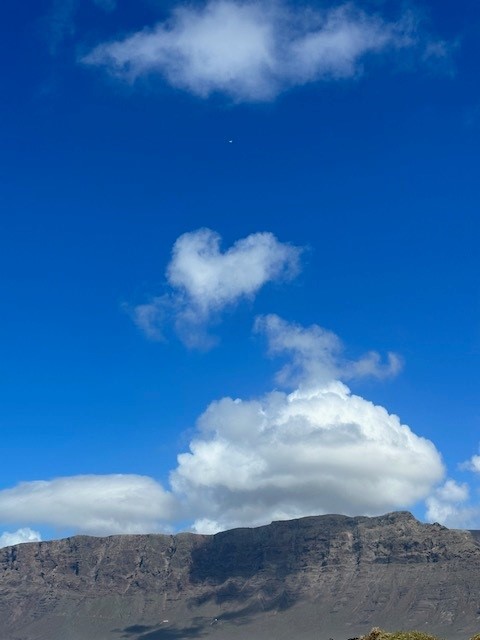 Risco of famara with a clowd forming a heart.